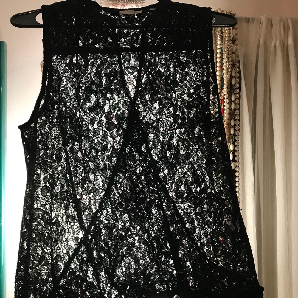 New York and Company Lace blouse. See through.